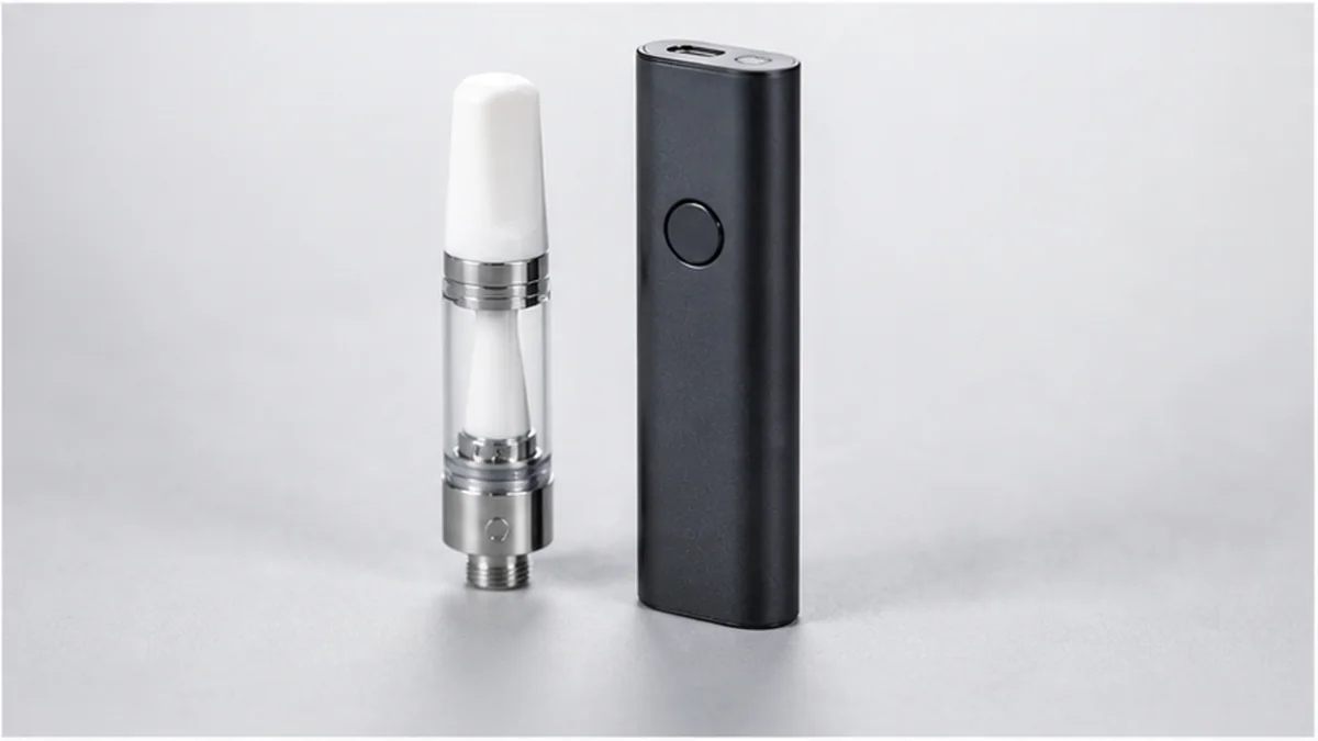 Ceramic cartridge paired with an adjustable vape battery