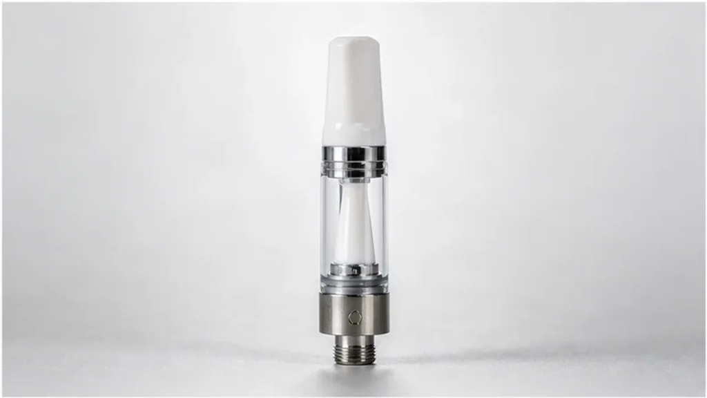 Ceramic core vape cartridge on a clean neutral background