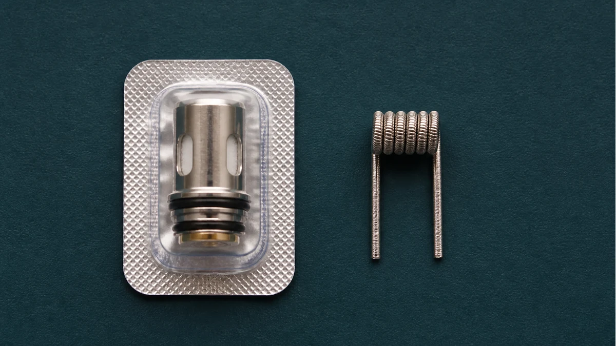 Factory coil head and rebuildable wire coil shown as distinct parts