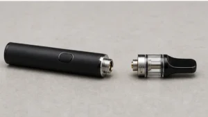 Powered-off 510 battery and atomizer separated at the connection