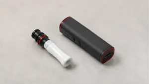 Ceramic nectar collector tip beside a compact wax pen body