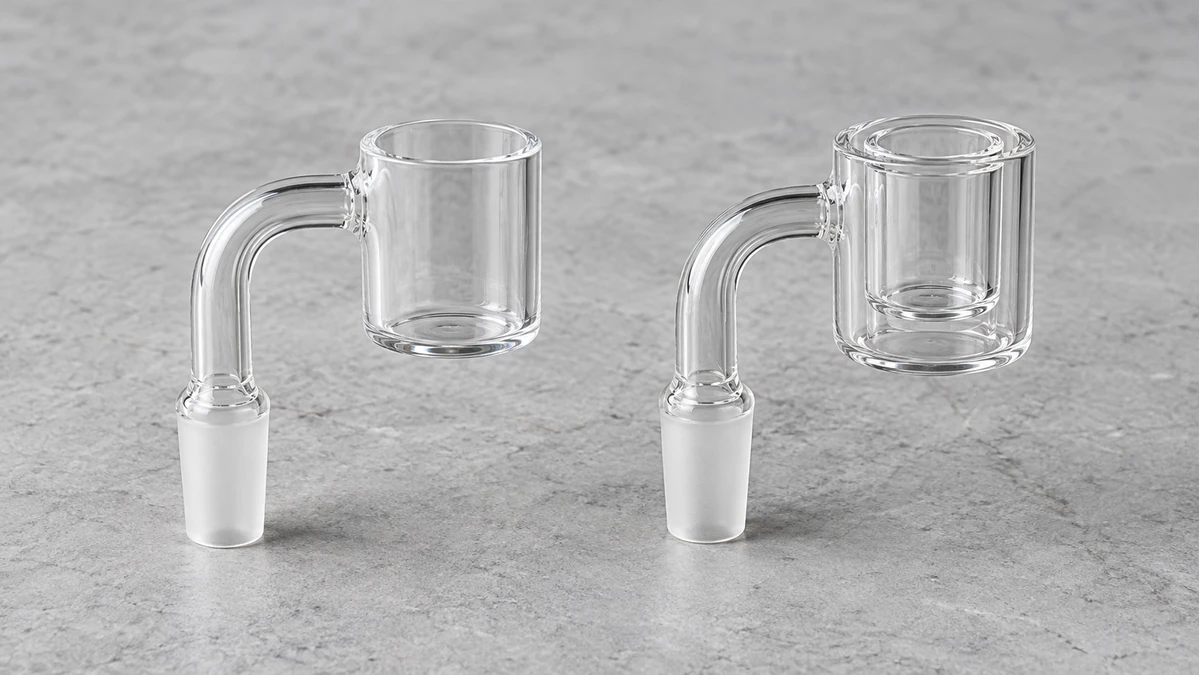 Standard quartz bucket beside a double-wall quartz thermal banger