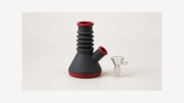 Accordion silicone body beside a separate clear glass bowl