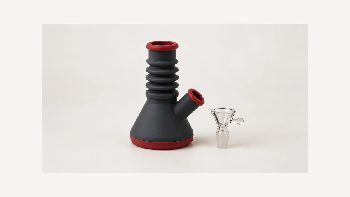 Accordion silicone body beside a separate clear glass bowl