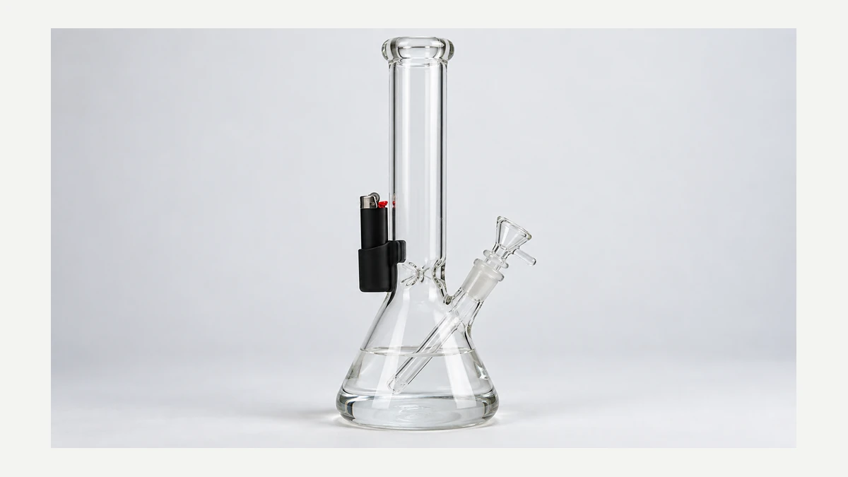 Glass bong with a removable silicone lighter holder