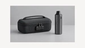 Closed accessory bag with integrated zipper lock beside inactive vaporizer