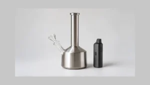 Generic steel water pipe beside a separate dry herb vaporizer