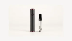 Inactive cartridge battery with unlit indicator beside an empty oil cartridge