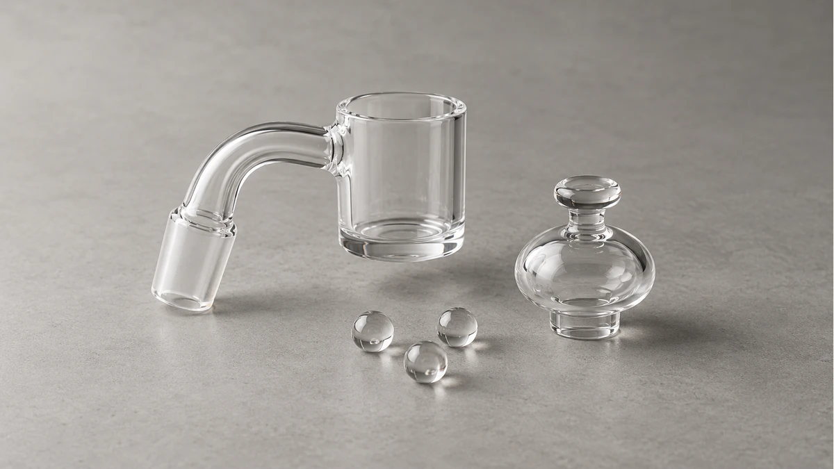Empty glass banger, detached glass cap and clear spheres Empty glass banger, detached glass cap and clear spheres