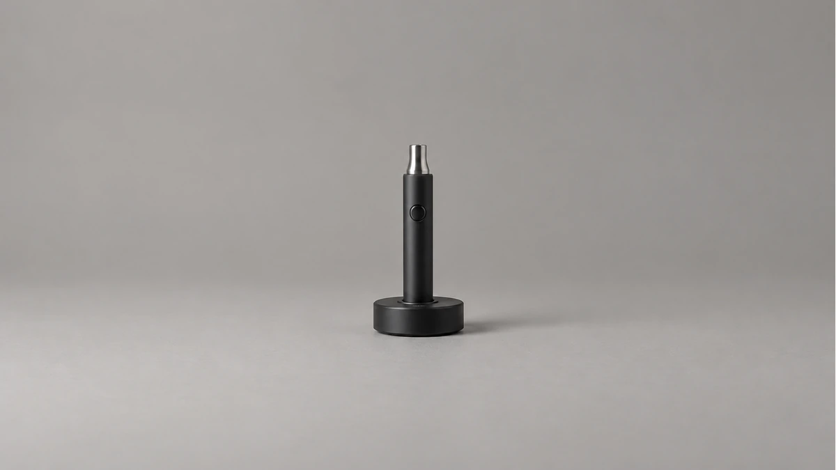 Powered off solid body wax pen in a broad passive desktop holder
