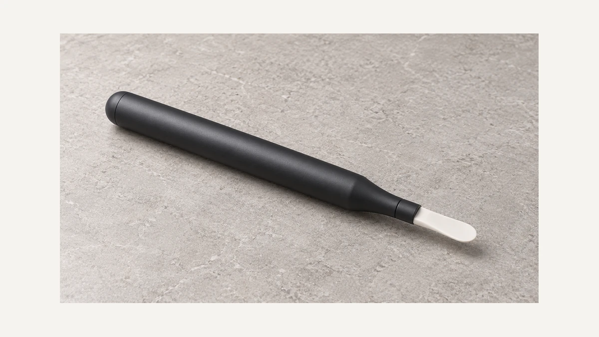 Full generic heated loading tool with a clearly visible pale ceramic spatula tip