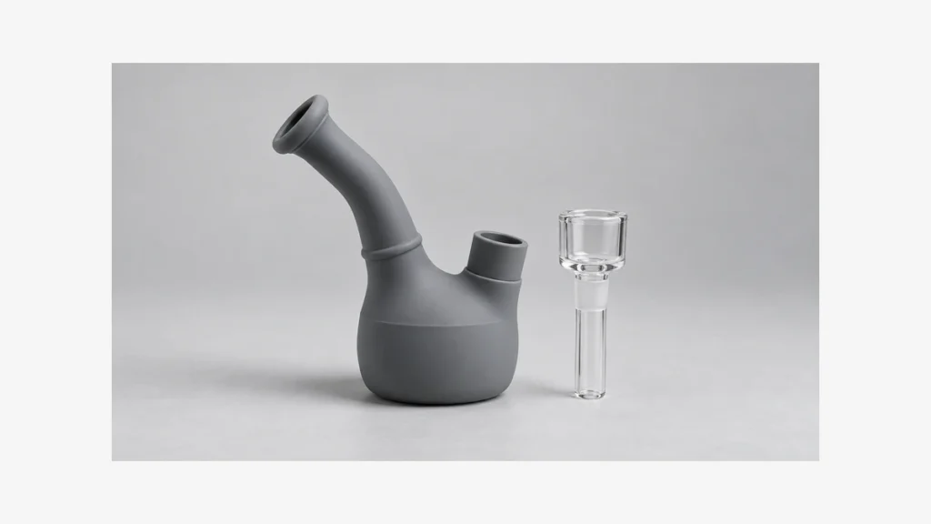 Silicone bubbler body beside a separate rigid fitting
