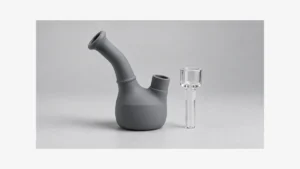 Silicone bubbler body beside a separate rigid fitting