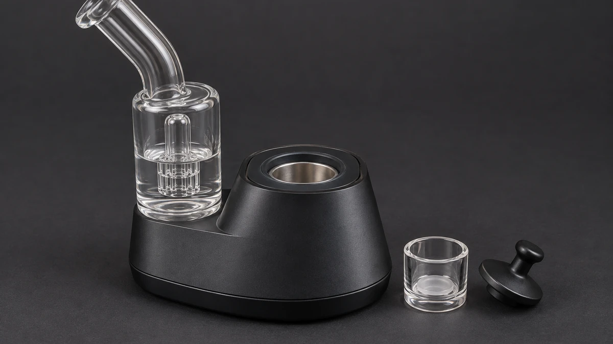 Large quartz insert shown outside a desktop electronic rig heating well