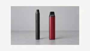 Two complete inactive opaque wax pen devices on a neutral tabletop